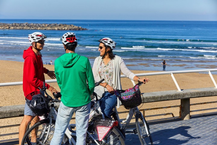 a group of people on a beach