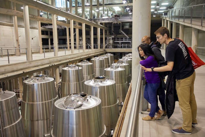 a woman standing in front of a building