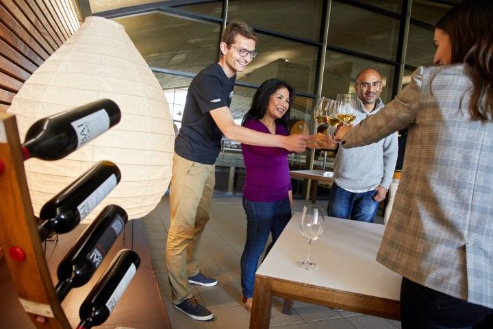 a group of people standing in a room